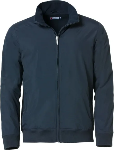 Giacca Newport — Giubbino autunno-inverno. Tessuto tecnico traspirante e idrorepellente. Tasche laterali con zip, interno colletto e fodera in micropile. Taschino interno con zip. Fondo e polsini a costina elasticizzata. Cerniera ricamata coperta. Fodera con zip per agevolare stampe e ricami.