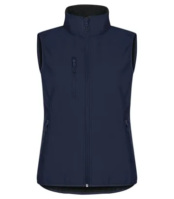 Gilet softshell Classic donna — Smanicato softshell in poliestere riciclato. Tessuto triplo strato elasticizzato, idrorepellente e antivento. Tre tasche esterne con zip. Due tasconi interni. Giromanica e fondovita elasticizzati.
